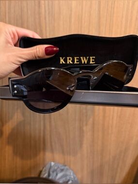 KREWE Black Round Frame Sunglasses with Dark Lenses